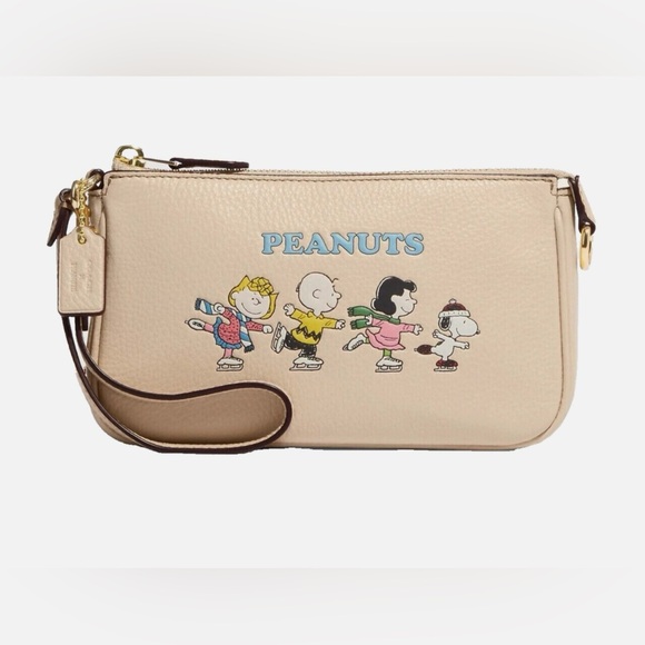 Coach Handbags - NWT Coach X Peanuts Nolita 19 With Snoopy And Friends Motif Wristlet Purse